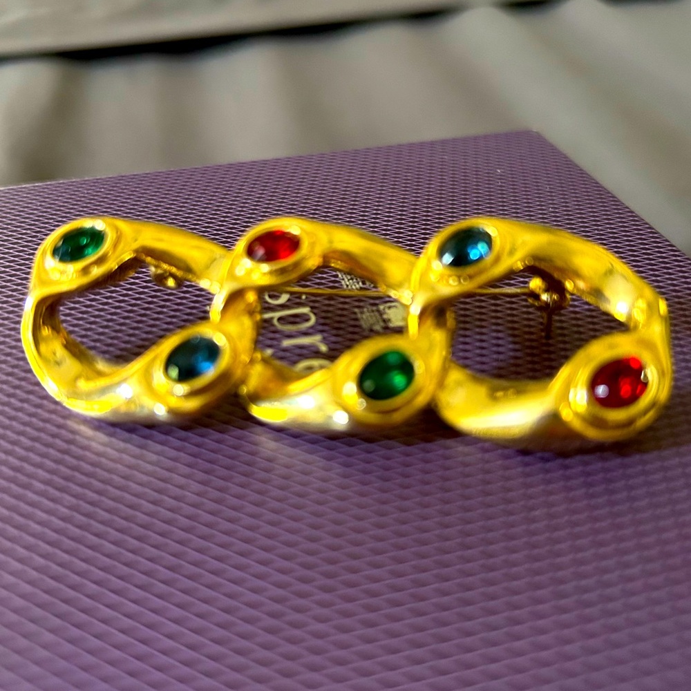 Gold Brooch with colored stones